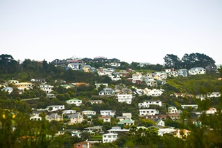 Houses on hillside.