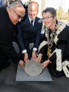 Chair of the Commonwealth Foundation Sir Anand Satyanand places the first Commonwealth Walkway marker at Wai-Titi landing with Jim Walker and Mayor Celia Wade-Brown