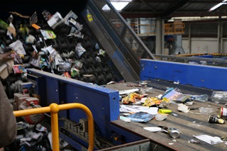 Image of conveyer belt at Oji recycling plant in Seaview