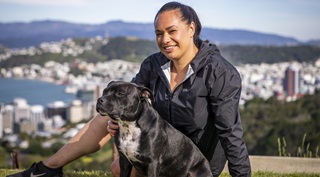 Mayor Tory Whanau posing with her dog Teddy.