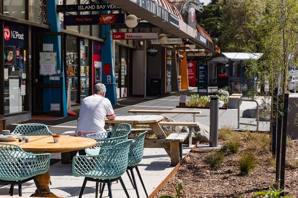 Island Bay shopping centre showing seating alongside the footpath.