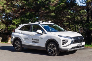 White vehicle with Council sign writing on it.