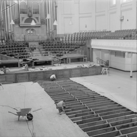 Relaying the floor in the Town Hall auditorium in 1956.