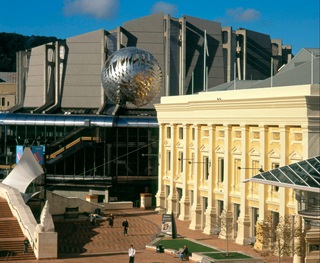 Wellington Town Hall as it is today against the backdrop of the Michael Fowler Centre.