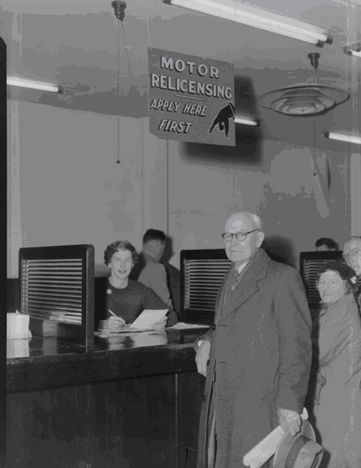 A motor relicensing counter at the Town Hall in 1955.