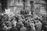 Unemployed workers protest in front of the Town Hall in 1933.