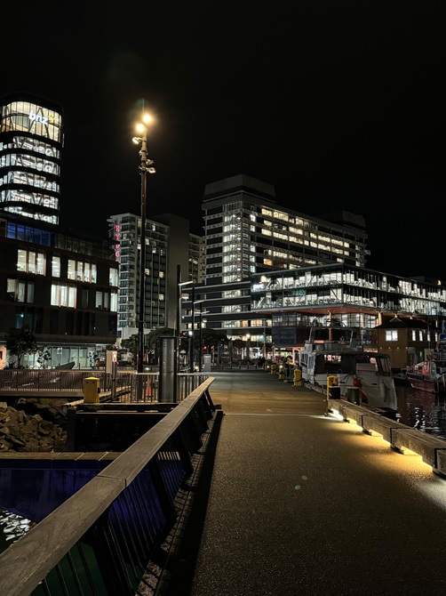 Waterfront at night after lighting improvements.