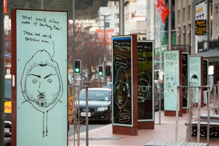 Image of Bryce Galloway light box exhibition on Courtenay Place.