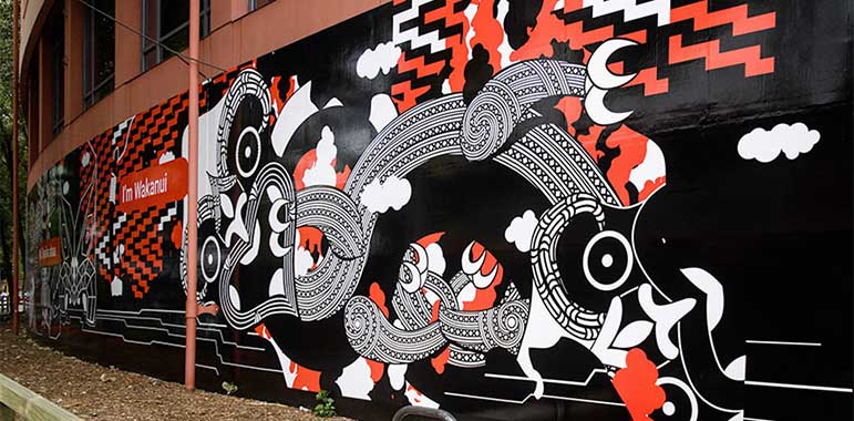 Black, white and red tupuna Maori mural.