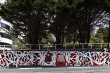 Large mural on Bowen Street, red, white and black with te reo designs.