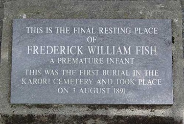 Gravestone of Frederick William Fish reading "A premature infant. This was the first burial in Karori Cemetery that took place on 3 August 1891".