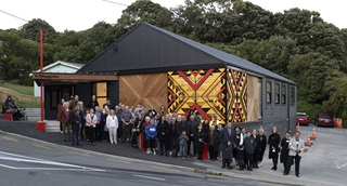 A crowd of people standing outside of Te Tūhunga Rau in Strathmore.
