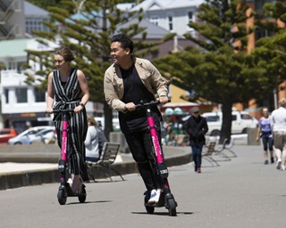Image of e scooters being ridden around Oriental Bay