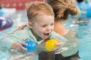 Image of baby in a pool