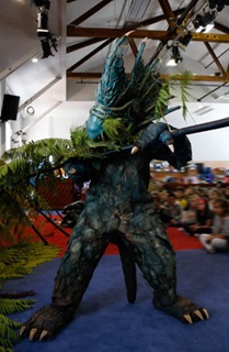Image of a taniwha in Waste Heroes performance at Kelburn School