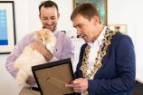 Mittens the cat with Mayor Andy Foster and owner Silvio Bruinsma.