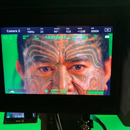A close-up shot of Toa Waaka on set filming Ahi Ka at Avalon Studios.