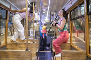 Image of performers on Cable Car for City Theatre