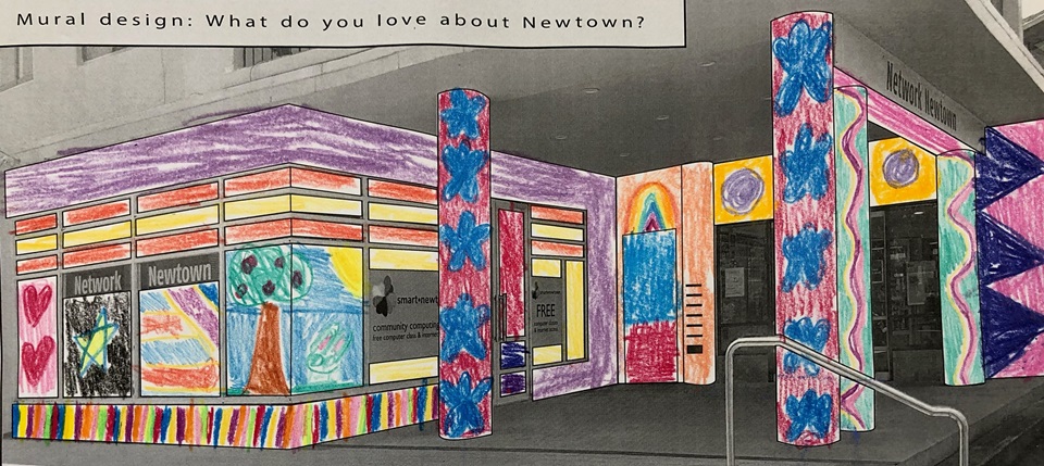 Black and white template of Newtown Library which has been coloured in a by a child with bright colours and designs. 