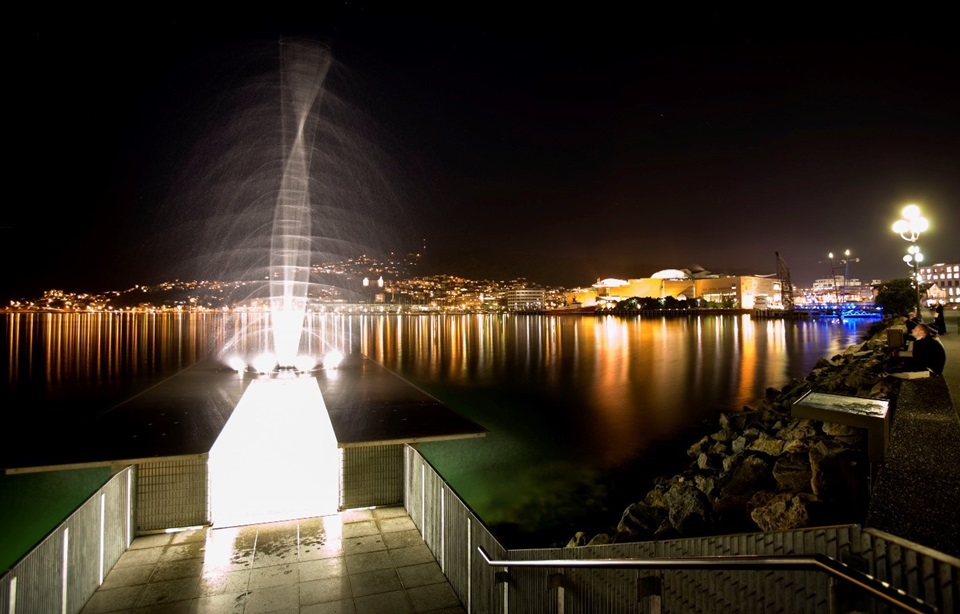 Image of Len Lye's Water Whirler operating in the evening 