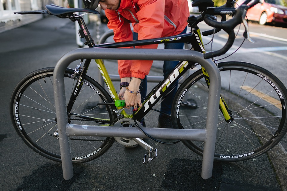Close up image of new bike racks being used by cyclist outside The Larder in Miramar