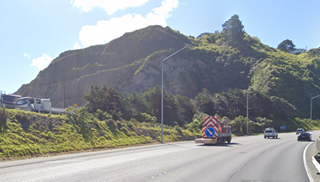 The north face of Kiwi Point quarry - seen from State Highway 1.