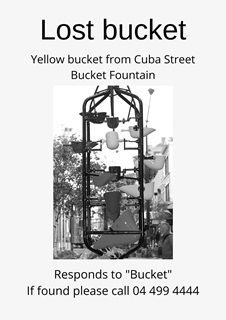 A fake black and white poster with a picture of the Bucket Fountain with text that reads 
