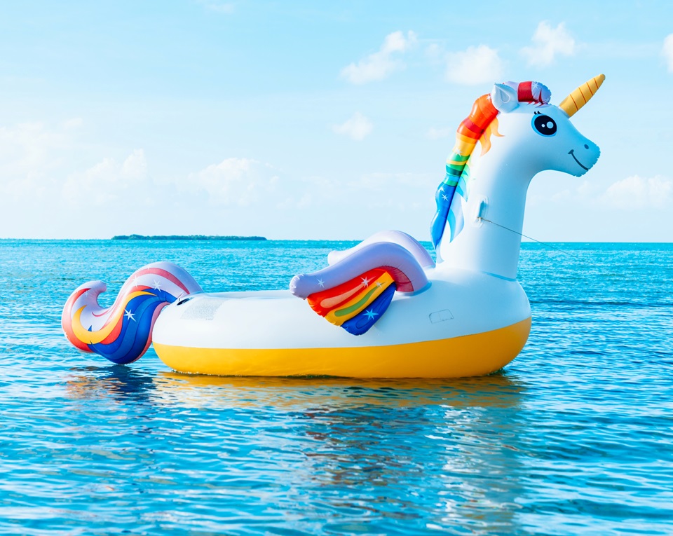 Image of a floating unicorn on water