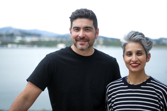 Raqi and Areito standing in front of the Wellington harbour.