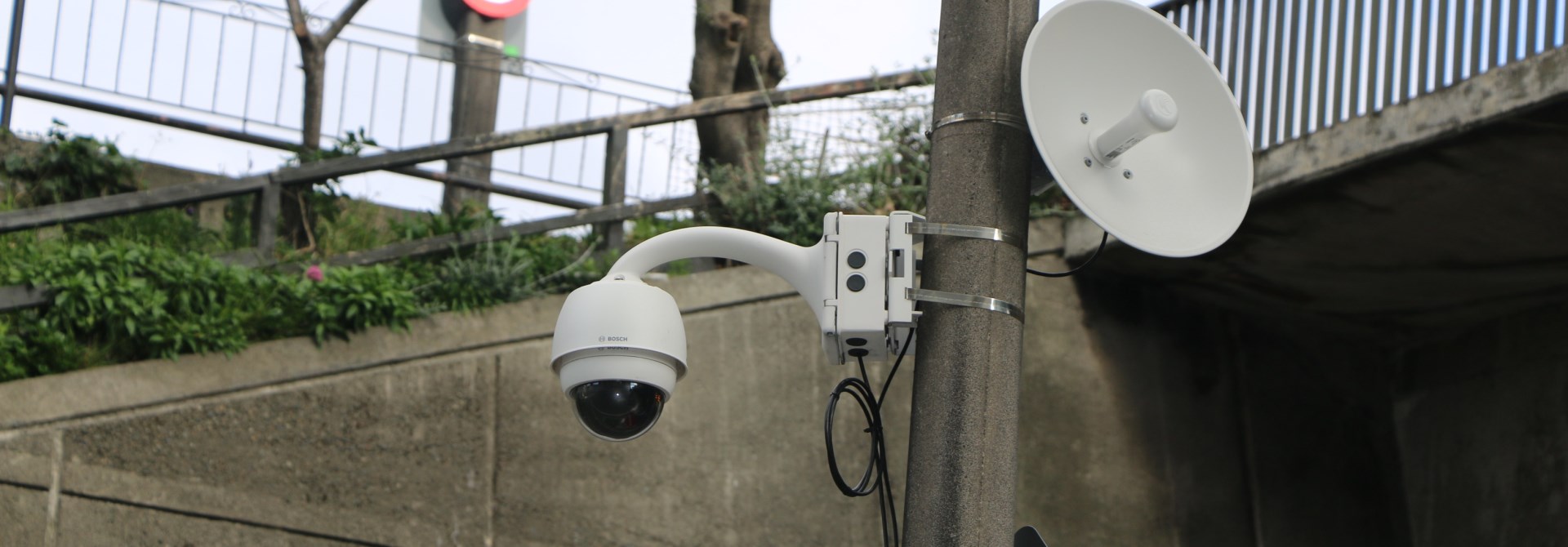 CCTV camera on a pole.