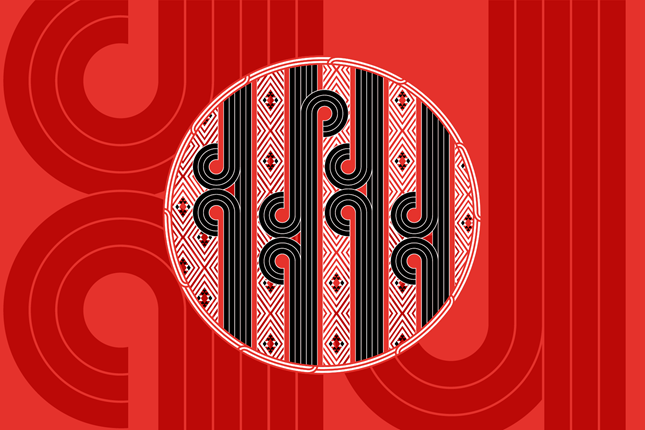 A red Māori koru design with a circular black and white design within it.