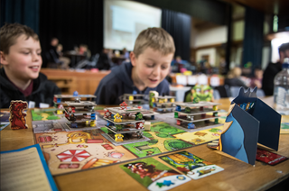 Kids playing board games.