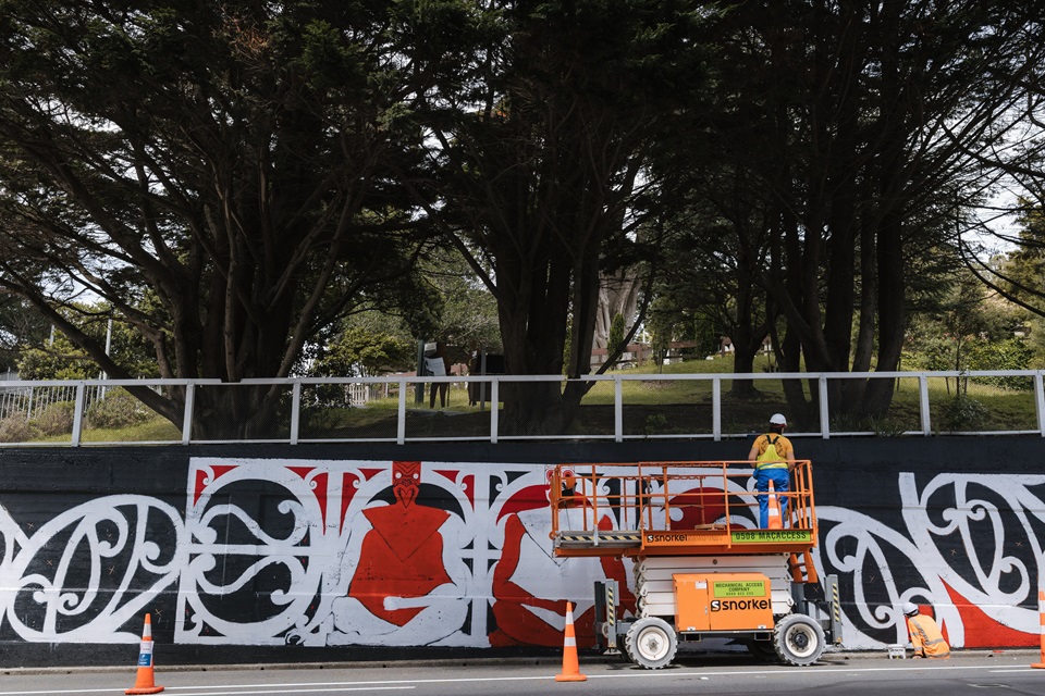 Ariki Brightwell painting on Bowen Street viewed from other side of road