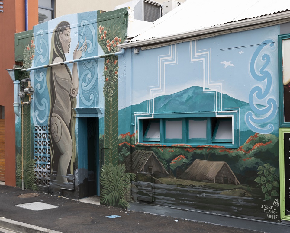 Māori artist and illustrator Izzy Joy mural on Garrett Street. 