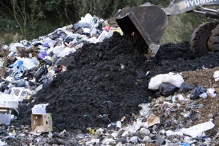 Sludge getting tipped out at the landfill.