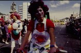 Performers in costume during James Smith Christmas Parade circa 1987