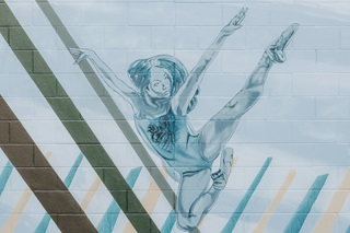 Painted dancer on the mural.