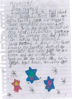 Letter from a young girl with stars drawn at the bottom of it.