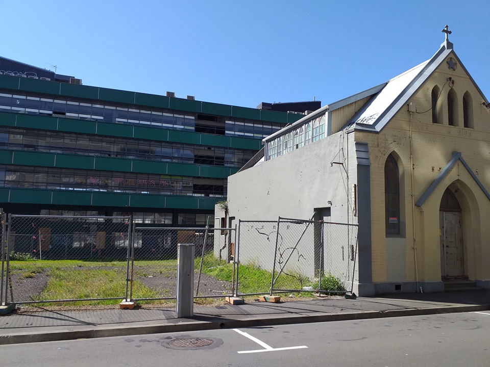 Site for Frederick Street Park with Chinese Mission Hall in foreground.