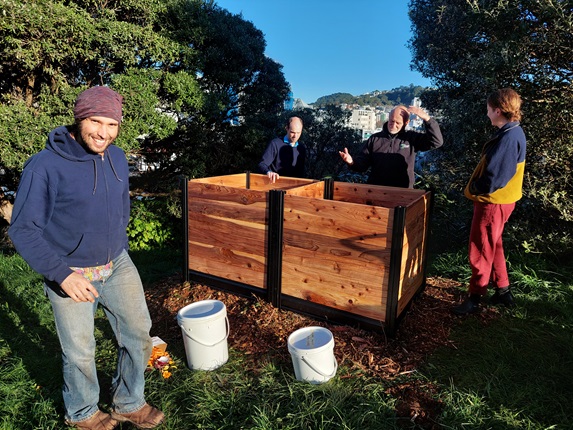 Michael Person (left) and Kate from Kaicycle (right) building compost hub in Kelburn