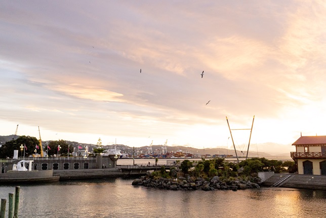 Whairepo lagoon with a sunset in the background.