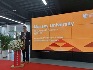 Massey University's Oli Wilson speaks at Xiamen University in China.