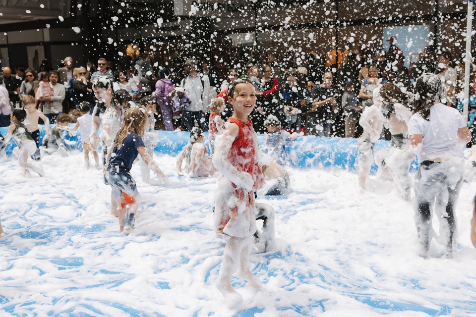 Children play in the foam pit during Christmas events in Wellington