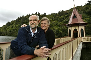 Zealandia founders standing on the bridge leading to the valve tower.