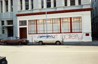 The old City Gallery building on Victoria Street in the 1980s with a retro car parked outfront.