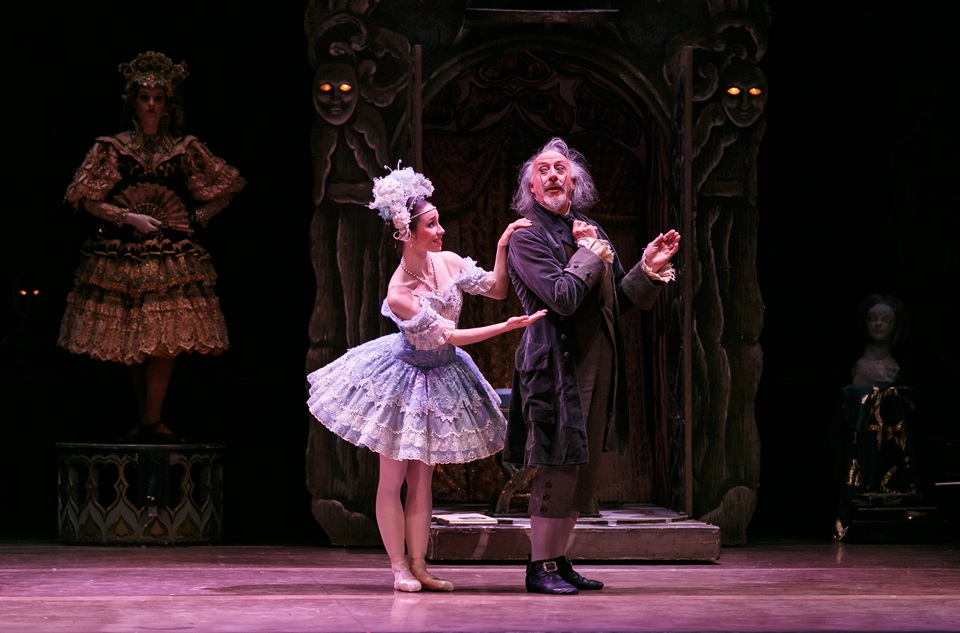 Sir Jon Trimmer performing on stage with Lucy Green in Royal New Zealand Ballet's Coppelia