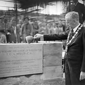 The foundation stone for the former Wellington Public Library being laid by Mayor Thomas Hislop in 1938.